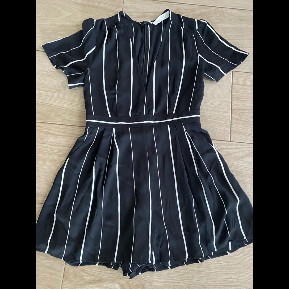 Black and white pin strip romper